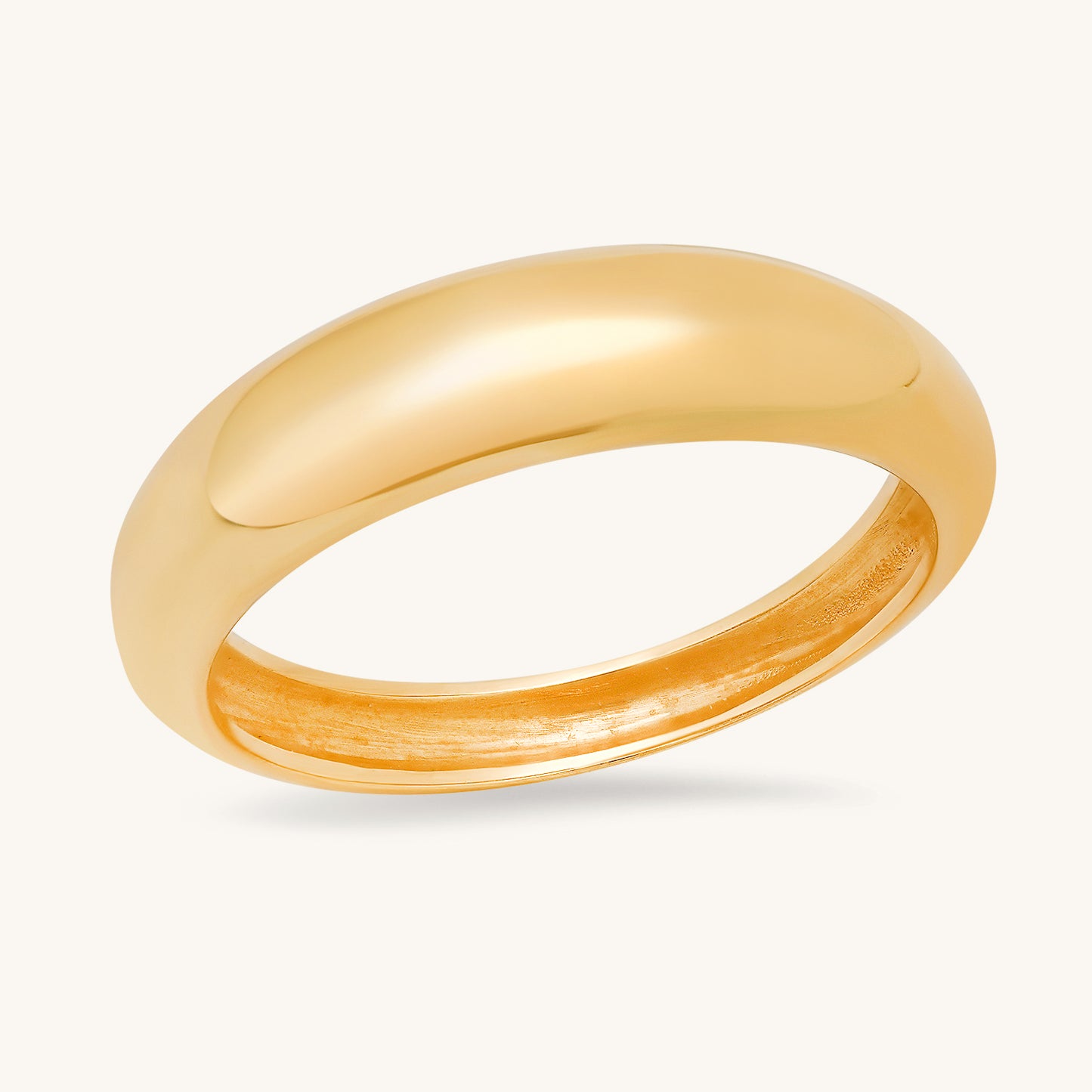 The "Duomo" ring is a stunning tribute to timeless simplicity and class, inspired by my sister-in-law Joelle's fashion studies in Florence. Just like the iconic Duomo cathedral that graces the skyline of Florence, this dome ring embodies her sense of enduring beauty and sophistication. This ring is made of 14-karat solid yellow gold. The average weight of this ring is 3 grams. The front band width of this ring is 5 millimeters. The back band width of this ring is 2